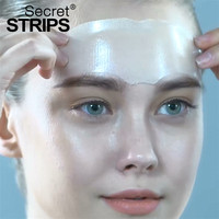Masque facial en feuille Secret Strips Luxury Herbal Crystal Organic avec collagène, acide hyaluronique et vitamine C pour peaux sèches et anti-âge