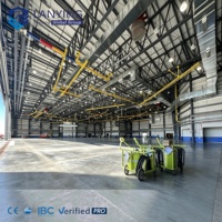 Hangar d'avion à structure en acier lourd SYLY, grande portée, sans colonnes, pour entreposage et maintenance aéronautique, porte roulante, modèle Q235B