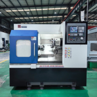 Torno CNC de Precisión XT04DS, Bancada Inclinada, Procesamiento Industrial de Metales