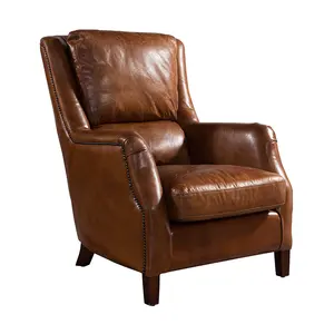 古色古香的高背棕色皮革软垫扶手椅