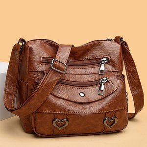 Sac à bandoulière pour femme tendance avec fermeture éclair et chaînes décoratives, grande capacité, en cuir - Product Image 1