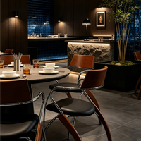 Table Ron Group en pierre, banquette en cuir noir, chaise à structure en acier inoxydable, mobilier moderne de luxe pour café, restaurant