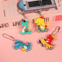 Vente en gros de porte-clés tendance en acrylique double face avec impression UV de dinosaures, petits accessoires de mode