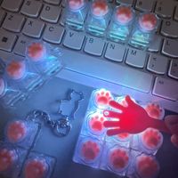 Porte-clés testeur de commutateurs multi-spécifiques en forme de patte de chat, jouet anti-stress en silicone en forme de patte, gadget de poche anti-stress en gros