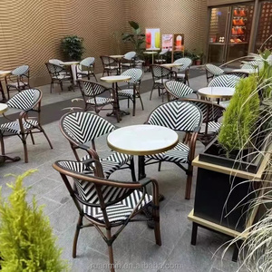 Chaises <span class=keywords><strong>de</strong></span> salle à manger en rotin PE Outdoor Cafe Courtyard Hotel Bakery Homestay Mobilier d'extérieur français Chaise empilable <span class=keywords><strong>de</strong></span> luxe - Product Image 1