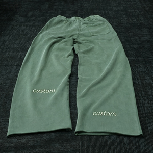 Pantalon de survêtement en toile pour homme, taille élastique, cordon de serrage, poches, style streetwear déchiré et vieilli - Product Image 1