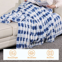 Plaid en fausse fourrure à motifs ondulés, doux et polyvalent, en polaire corail, idéal pour l'hiver