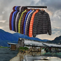 Veste matelassée décontractée pour homme en duvet de canard brun uni teint en 2026, vente en gros, col montant, hiver, capuche, rembourrage en polyester, taille XS