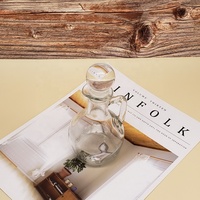 Vente en gros 5oz mini bouteille à poignée en verre pour huile de cuisson vinaigre sauce de soja avec couvercle bouchon épice liquide pot d'emballage en verre