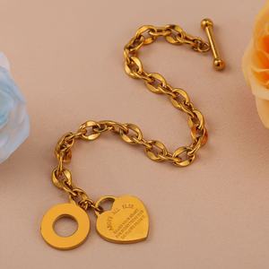 Bracelet et jonc anti-ternissement en acier inoxydable plaqué or 14k 18k, fin et élégant, avec breloque cœur, pour femme - Product Image 3