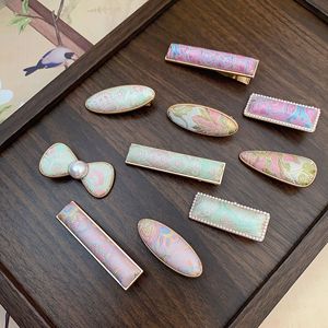 กิ๊บติดผมทรงจีนสำหรับผู้หญิง ยี่ห้อ Hope Xi Makeup Songjin  วัสดุโลหะผสมทองแดง ดีไซน์สดใสหวานละมุน - Product Image 1