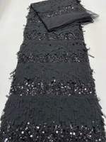 Tulle de luxe à franges horizontales en maille, orné de cristaux et de sequins de tailles variées, brodé de perles, pour robes de haute couture et tenues de soirée.