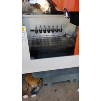 Machine de gravure et de fraisage CNC 800x500x300mm avec ATC pour perçage, taraudage et chanfreinage, idéale pour le travail des moules en aluminium et cuivre