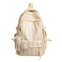 Sac à dos léger pour étudiants, sac de voyage pour l'école, sac à dos quotidien pour les étudiants universitaires avec pendentif