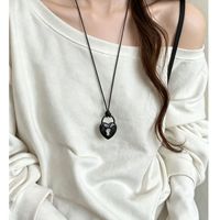 Collier en cordon noir avec pendentif Cadenas et Clé Cœur pour couple, accessoire long et superposable pour pull