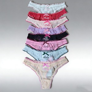 Tanga de punto fino de cintura media con encaje de malla transparente y lazo decorativo, ropa interior sexy y cómoda para chicas. - Product Image 1