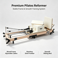 Reformer de Pilates pliable en bois d'érable durable avec système de poulie réglable à 7 vitesses de type voile pour usage en studio de Pilates