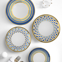 Service de table en porcelaine fine de style moderne et luxueux, imprimé géométrique bleu et or, pour hôtels, banquets et mariages