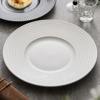 Assiette à dîner en céramique à texture créative, plat de service élégant en porcelaine embossée pour hôtels haut de gamme