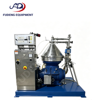 Centrifugeuse séparatrice à disques d'occasion à haute efficacité pour la séparation fine solide-liquide et le processus de clarification de l'huile