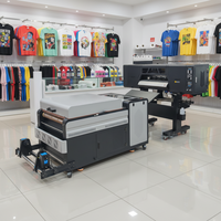 Imprimante DTF à séchage rapide 2 têtes A1 pour la production en série de vêtements personnalisés et machine d'impression DTF tout-en-un avec four et agitateur de poudre