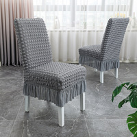 Housse de chaise universelle à dossier haut, à volants, couleur unie, en polyester et élasthanne, style moderne, lavable en machine, personnalisable, prix de gros abordable