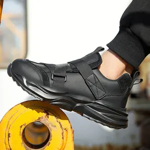 حذاء أمان جديد خفيف الوزن من الجلد المصنوع من الألياف الدقيقة تصميم أنيق للرجال، حذاء أمان أسود بمشبك لاصق