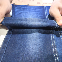 Tissu denim indigo Aufar Slim tissu denim recyclé pour uniformes conception de dinde rouleaux de denim marchandises prêtes tissu 100% coton uni