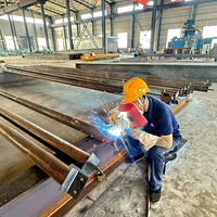Almacén de estructura de acero de dos pisos de diseño moderno con envío rápido para taller Construcción de paneles sándwich de cobertizo de garaje