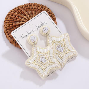 Boucles d'oreilles tissées mode élégante étoile créative perles de riz blanc pendentif boucles d'oreilles pour femmes Uionen 1869 - Product Image 1