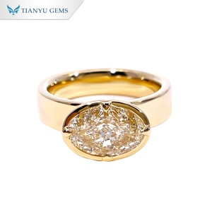 แหวนแต่งงานผู้ชาย TIANYU GEMS ทองคำ 14K สีเหลือง ประดับเพชรโมอิสซาไนต์ทรงรีสีแชมเปญ - Product Image 1