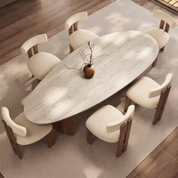 Table à manger moderne de luxe en pierre frittée de travertin de style français vintage, forme goutte d'eau, avec base en bois de frêne massif pour villa
