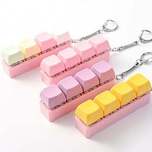 Juguete Antiestrés Creativo de Plástico con Cuatro Botones, Llavero Pequeño, Colgante Novedoso y Único - Product Image 1