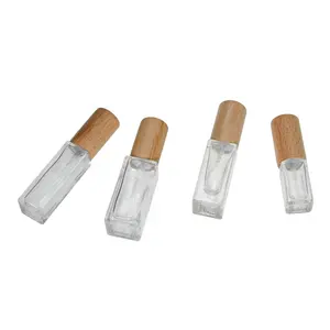 Sampel mewah botol kecil kosong persegi buram bening 3ml 5ml 10ml 20ml botol semprot perak parfum kaca dengan tutup kayu