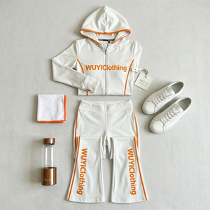 OEM/ODM 2026 Trendy <b>White</b> Women's Tracksuit <b>Set</b> Slim Fit Cropped Zip-Up Hoodie and Flare Pants Orange Piping Athleisure Outfit - Product Image 3