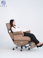 Chaise de bureau ergonomique à dossier haut avec repose-pieds pivotant en cuir écologique et hauteur réglable
