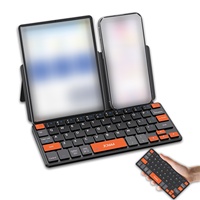 Nouveau clavier mini sans fil universel BT, design compact, touches de navigation orange, support multi-angles, clavier pour Android IO.S Type-C