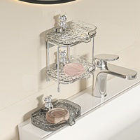 Support mural transparent en plastique sans perçage pour savon, design compact et luxueux, idéal pour petite salle de bain, lavabo ou robinet, pour le rangement quotidien du savon.