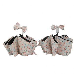 Sombrilla Plegable Anti-UV con Estampado de Flores Amarillas Pequeñas y Goma Negra, para Viajes, Días Soleados y Lluviosos, con Logotipo Personalizado - Product Image 5