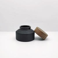 Pot cosmétique de haute qualité 100g en verre noir mat à épaule inclinée avec couvercle en bambou pour crème