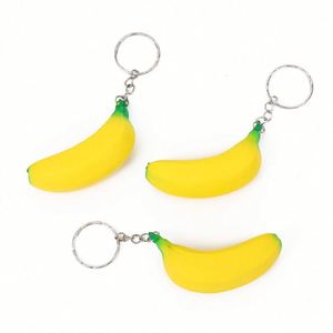 Porte-clés anti-stress en forme de banane en PU avec logo personnalisé, jouets anti-stress publicitaires de marque - Product Image 1