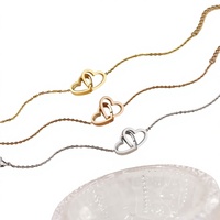 Bracelet en alliage à double anneau entrelacé en forme de cœur, style international, best-seller, avec double fermoir, également utilisable comme bracelet de cheville, cadeau sur le thème de l'amour, bijou de main