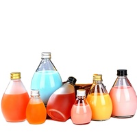 Bouteille de boisson en verre en forme de goutte d'eau avec bouchon à vis en aluminium pour l'emballage de jus, de lait, de thé et de boissons froides
