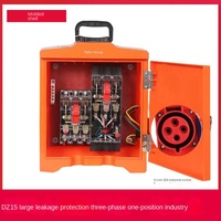 Boîtier de distribution triphasé portable DZ15 avec protection contre les fuites, sortie 32A, coque ABS orange, indice de protection IP54, verrouillage anti-effraction pour