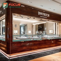 Comptoir de présentation pour bijouterie en verre trempé, aménagement intérieur de magasin de bijoux de luxe