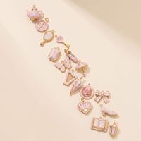 Ciondolo Vintage in Stile Femminile con Fiocco, Libro e Farfalla in Acciaio Inox Placcato Oro con Pizzo Rosa Francese, Accessori per Gioielli Fai-da-Te