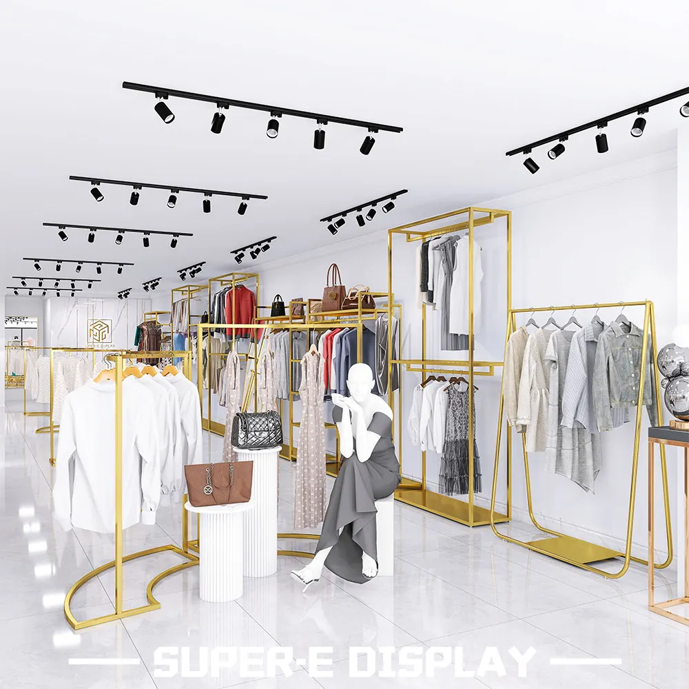 Lady Boutique Store mobili a parete scaffali oro in acciaio inox abbigliamento espositore negozio di abbigliamento Interior Design per l'indumento