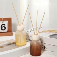Diffuseur de parfum en bouteille de 100 ml en vente chaude, bouteille d'aromathérapie avec bâtonnets en rotin pour huile aromatique
