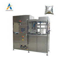 Machine automatique de remplissage bouchage de poche de bavoir aseptique liquide jus de vin rouge eau lait huile d'olive remplissage de sac dans la boîte
