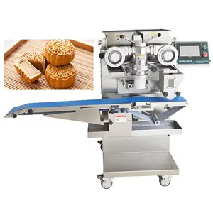 Encrusting machine for making biscuit and Maamoul date bar cookies